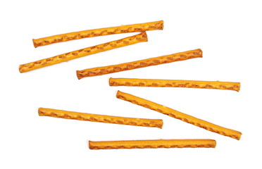 Salty cracker pretzel sticks isolated on white background, top view