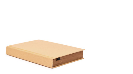 Perspective view of closed book mock up brown cover isolated on white background. copy space, template