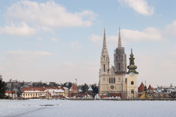 Zagreb Cathedral and city skyline during winter and snow as seen from Gradec, Zagreb, Croatia.