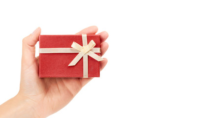 female hand holding red present box. Isolated on white background. copy space, template