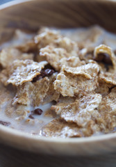 cornflakes in a brown clay plate