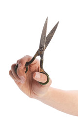 Female hand holding scissors, isolated on white background