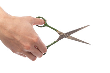 Obraz premium Female hand holding scissors, isolated on white background