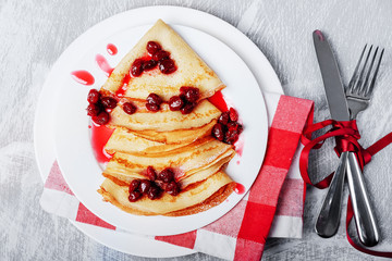 Russian pancakes with cornelian cherry jam