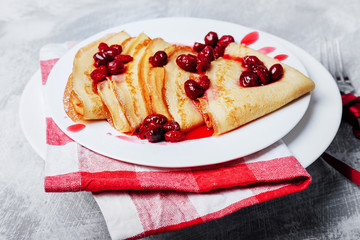 Russian pancakes with cornelian cherry jam