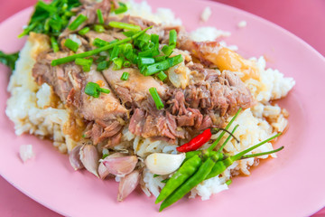 Stewed pork legs top on rice in Thai when we call 