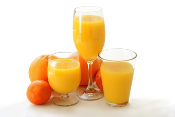 sweet ,juicy oranges and juice as drink