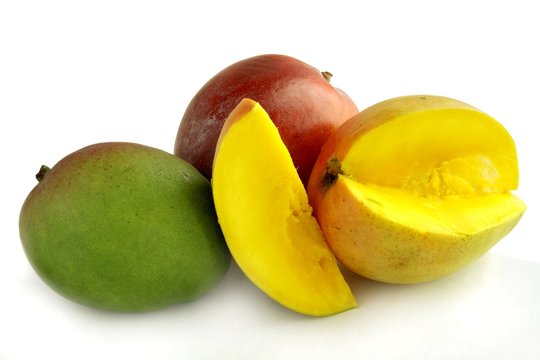 sweet and juicy tropical fruits mangoes