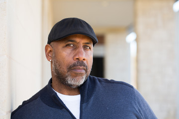 Mature African American man in deep thought.