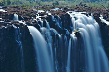 Victoria Falls, long exposure photo. Zambezi river, Unesco world heritage site, Zimbabwe Africa.