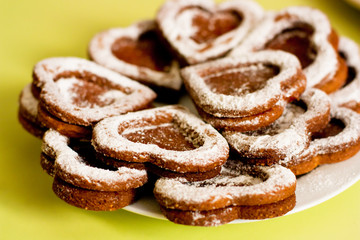 Cookies in shape of hearts on a white plate