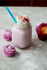 Pastel picture. Delicious dessert in pink tones. Marshmallow and milk strawberry cocktail