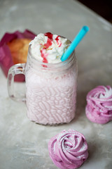 Pastel picture. Delicious dessert in pink tones. Marshmallow and milk strawberry cocktail