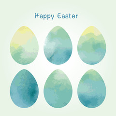 Watercolor style Easter eggs in blue-yellow-green color scheme on gentle blue background
