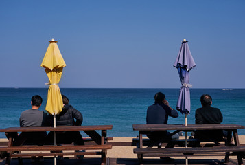 People resting on the beach