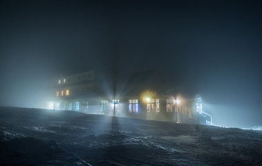 Mountain shelter Silesian House near Sniezka Mount at night in Karkonosze, Sudety, Poland