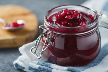 Traditional scandinavian jam with cowberry and juniper - obrazy, fototapety, plakaty