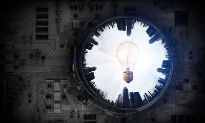 Circled cityscape and bulb