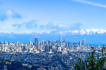 Beautiful view over San Francisco skylinge from Twin Peaks, blue sky, some clouds in California, USA