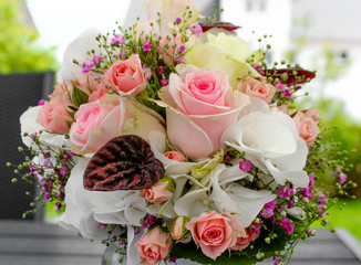 Beautiful flower bunch with roses, gypsophila, violets and leaves, bridal bouquet