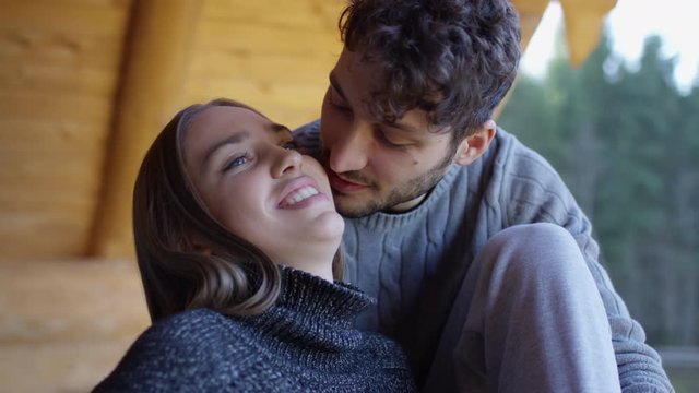 Man kissing his girlfriend