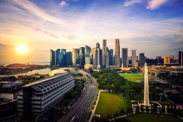 Kissenbezug cityscape of Singapore city and business center on morning sunrise © anekoho