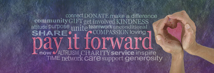 PAY IT FORWARD with love word cloud - campaign banner with female hands making a heart shape on right with a PAY IT FORWARD word cloud beside on a rustic purple green parchment background
