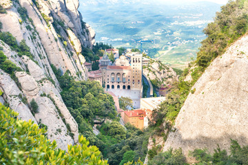 Landscape with Montserrat mountain and famous monastery in it - obrazy, fototapety, plakaty