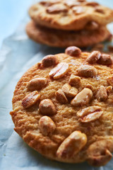 close up cookies with peanuts on the flour
