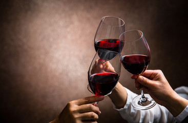 toasting with wine glasses