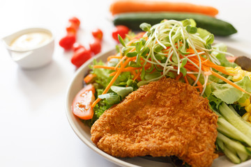 Top view Fresh healthy caesar chicken salad on white background.