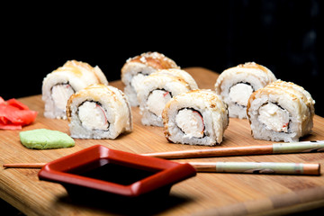 Dragon sushi roll with eel and cream cheese.