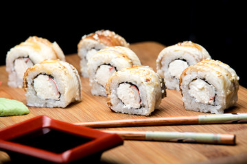 Dragon sushi roll with eel and cream cheese.