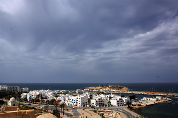 Top view of the hot summer city on the sea