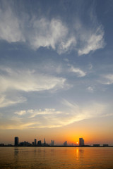 A beautiful view of Bahrain skyline during evening hours at sunset