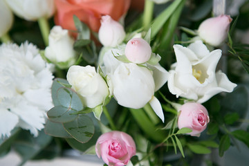 Delicate bouquet of roses, eustoma and cloves with eucalyptus branches