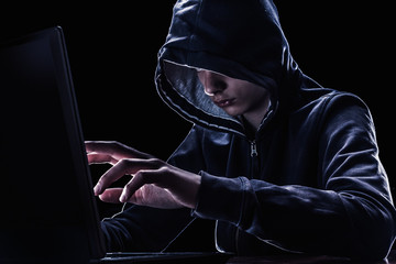 Computer hacker hacking.