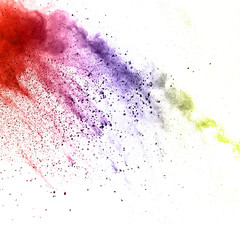 Multicolored powder explosion isolated on white background.