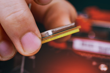 Engineer Technician plug in computer CPU microprocessor to motherboard socket. technology...
