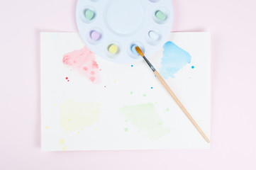 pastel easter eggs in a paint palette