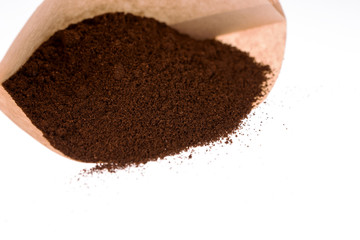 Unbleached paper coffee filter with ground coffee