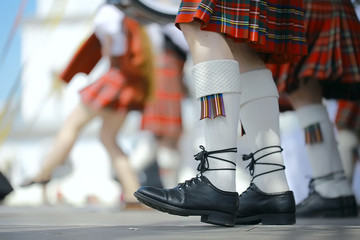 feet in Scottish skirts, the Scottish National Orchestra plays on St. Patrick's Day, holiday costumes for men
