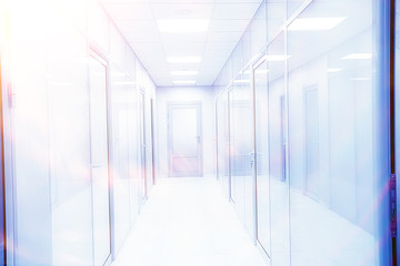 modern medical clinic, bright blurred background, corridor, spacious modern medical facility, hospital new
