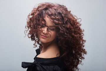 Portrait of young woman with trend curly hair, professional hair coloring - obrazy, fototapety, plakaty