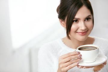 Beautiful Woman With Cup Of Coffee.