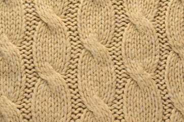 Knit Texture of Beige Wool Knitted Fabric with Cable Knits Pattern as Background
