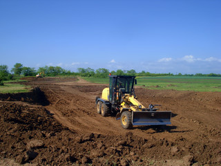 The grader working on construction site