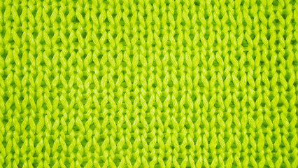 Beautiful knitted background of green yarn.