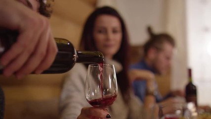 Pouring wine into a glass