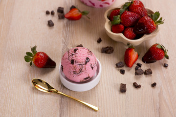 Chocolate fondue melted with fresh strawberries